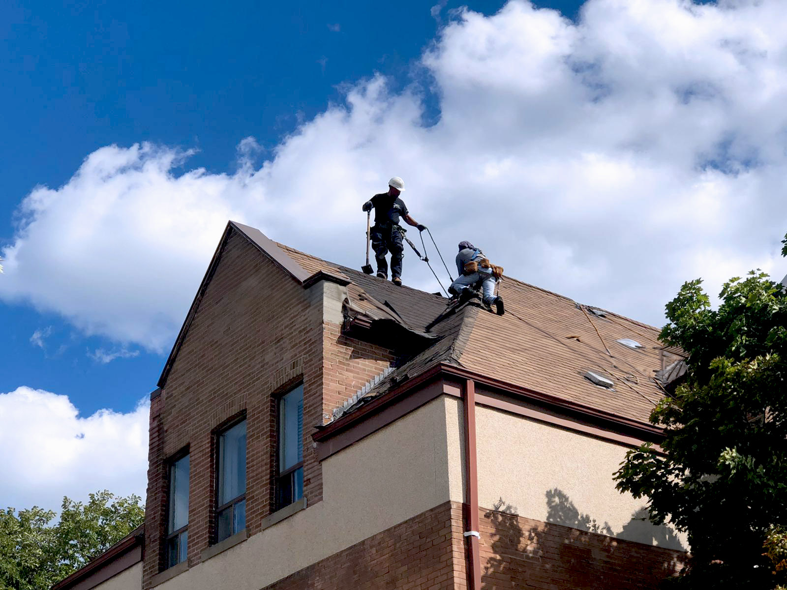 men woriking on a roof